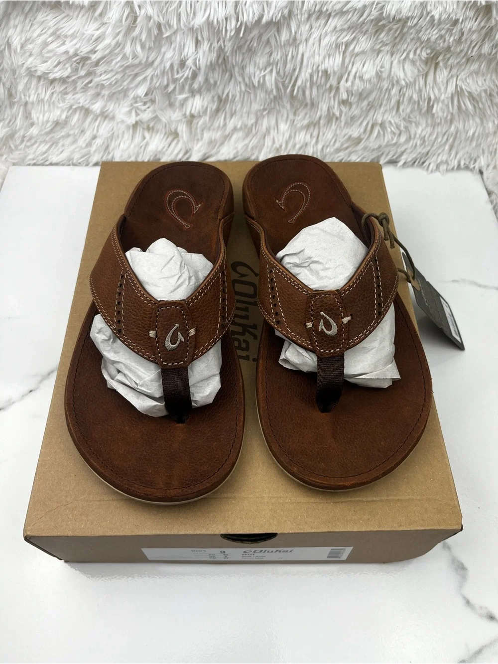 OluKai Men's Nui Rum Brown Leather Flip Flops